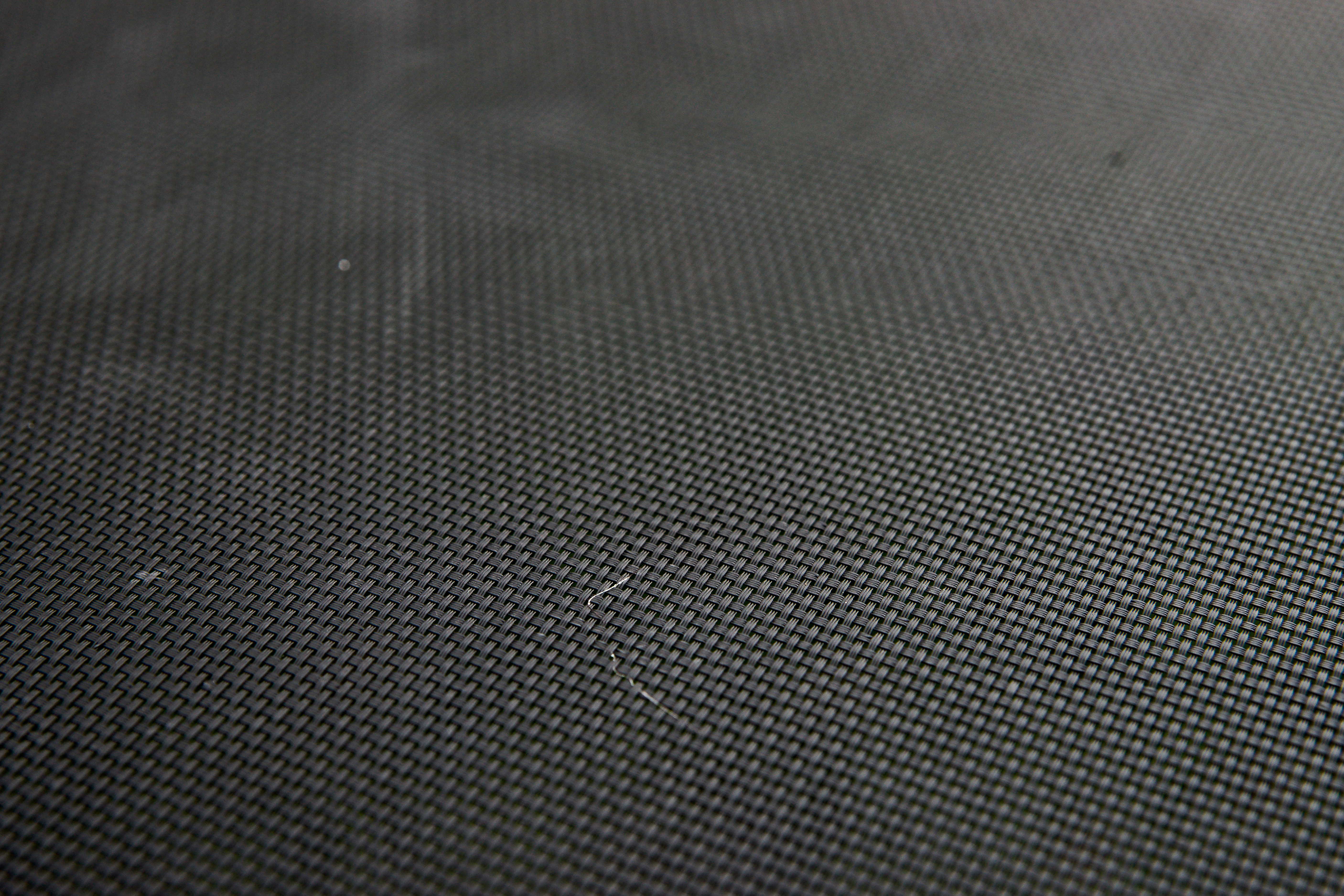 black plastic woven mesh background texture | www.myfreetextures.com